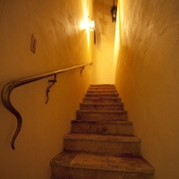 Staircase With Antique French Reclaimed Burgundy Dalles floortiles  