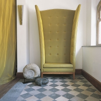 Old stone floor in checkerboard with exquisite surfaces for a modern designed hall at the seaside.