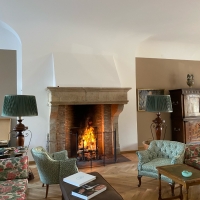 Grand French Country Style Limestone Fireplace Surround Installed in Bavaria, Germany