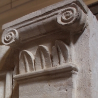 Antique fireplace surround detail in French limestone