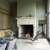  European Antique Renaiscance Limestone Statement Fireplace In Grand Kitchen With AGA Stove